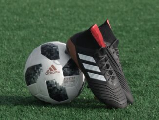 Image of a football and a pair of football shoes