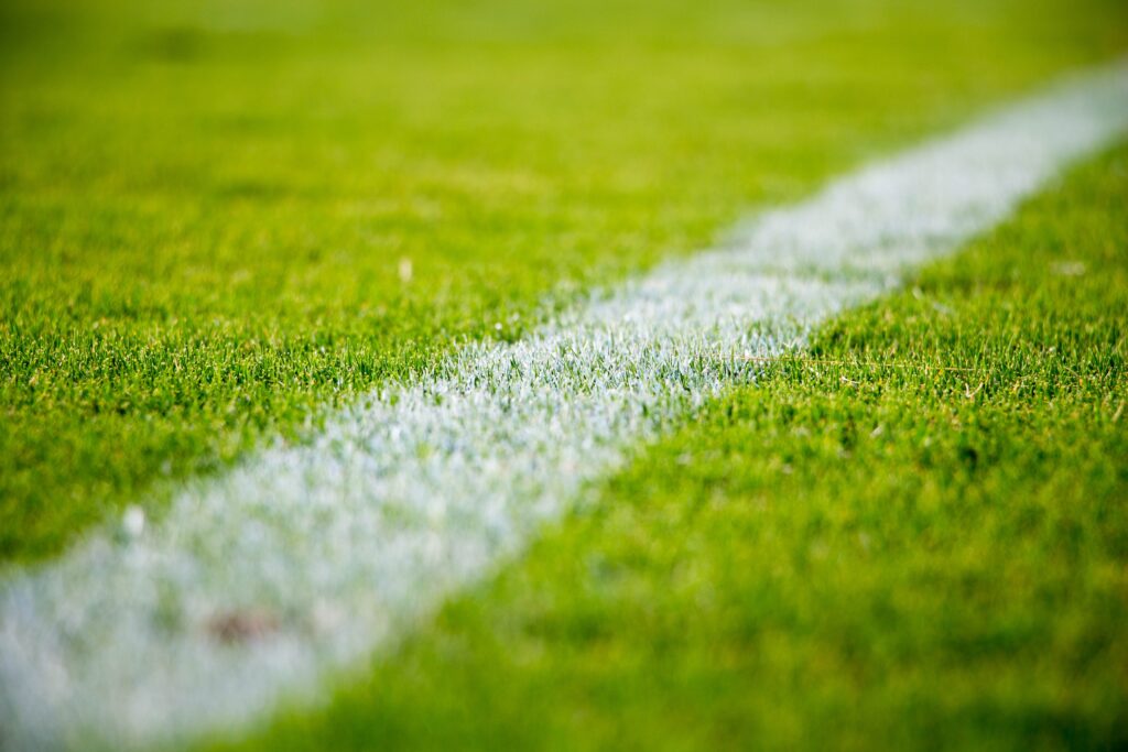 A white line on a football pitch. opportunities